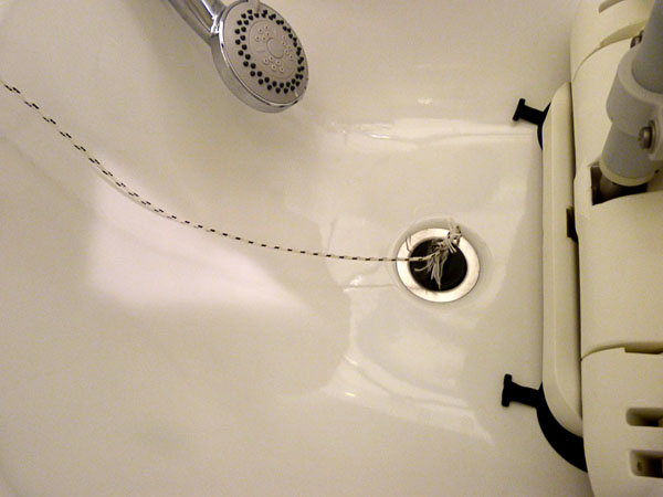 String attached to bathtub plug