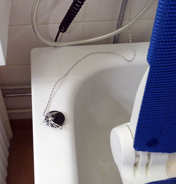 String attached to bathtub plug
