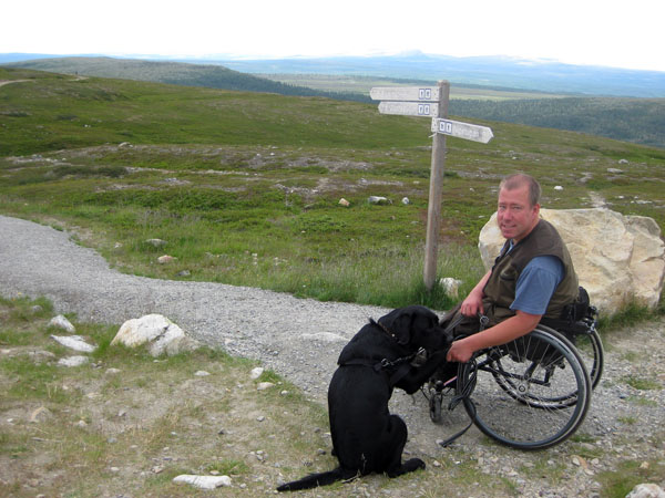 User with his dog in the mountains. Photo: from the user's archives