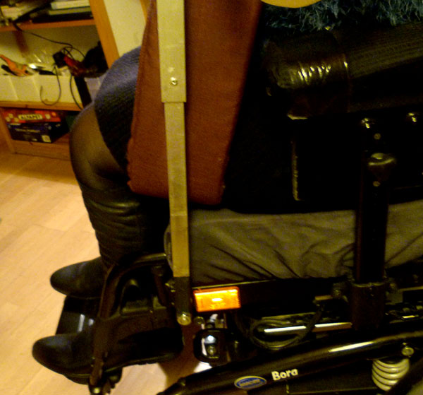 Fittings for lift on wheelchairs footrests